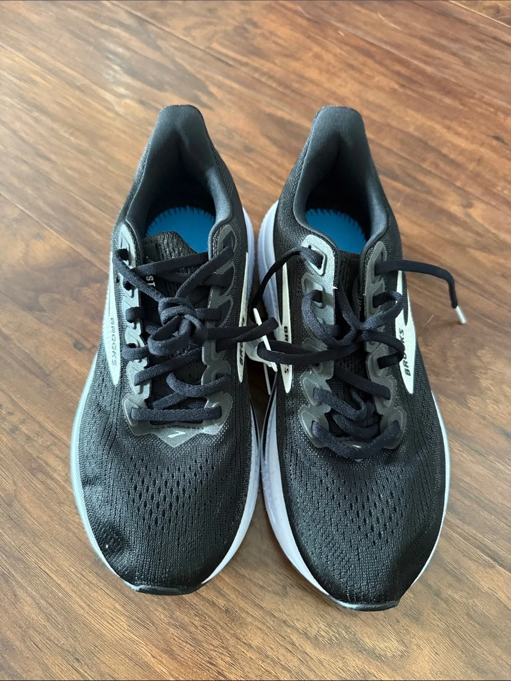 Black Athletic Running Shoes with White Midsole